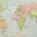 Vintage world map highlighting colonial empires and territories (labels in Russian), showing mid-20th-century colonial geography for historical context.