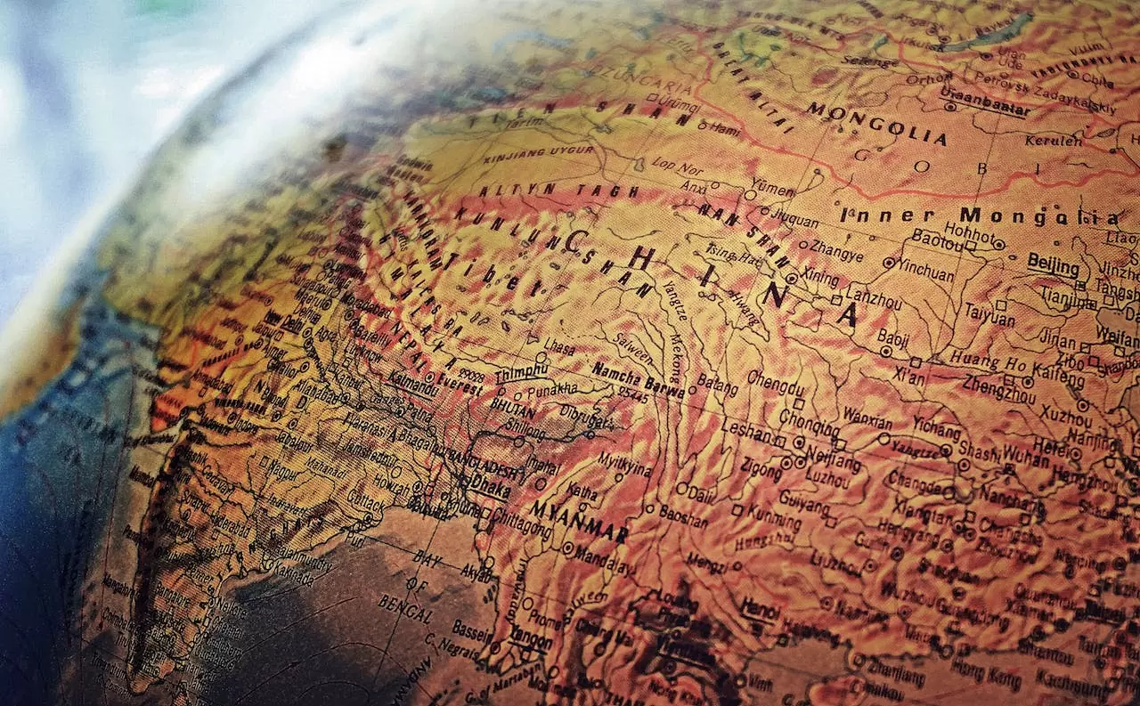 World map detail showcasing Asian countries ending in '-stan,' indicative of the region's historical and linguistic heritage.