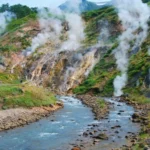 Steaming geysers and hot springs along the Geysernaya River in Kamchatka’s Valley of Geysers