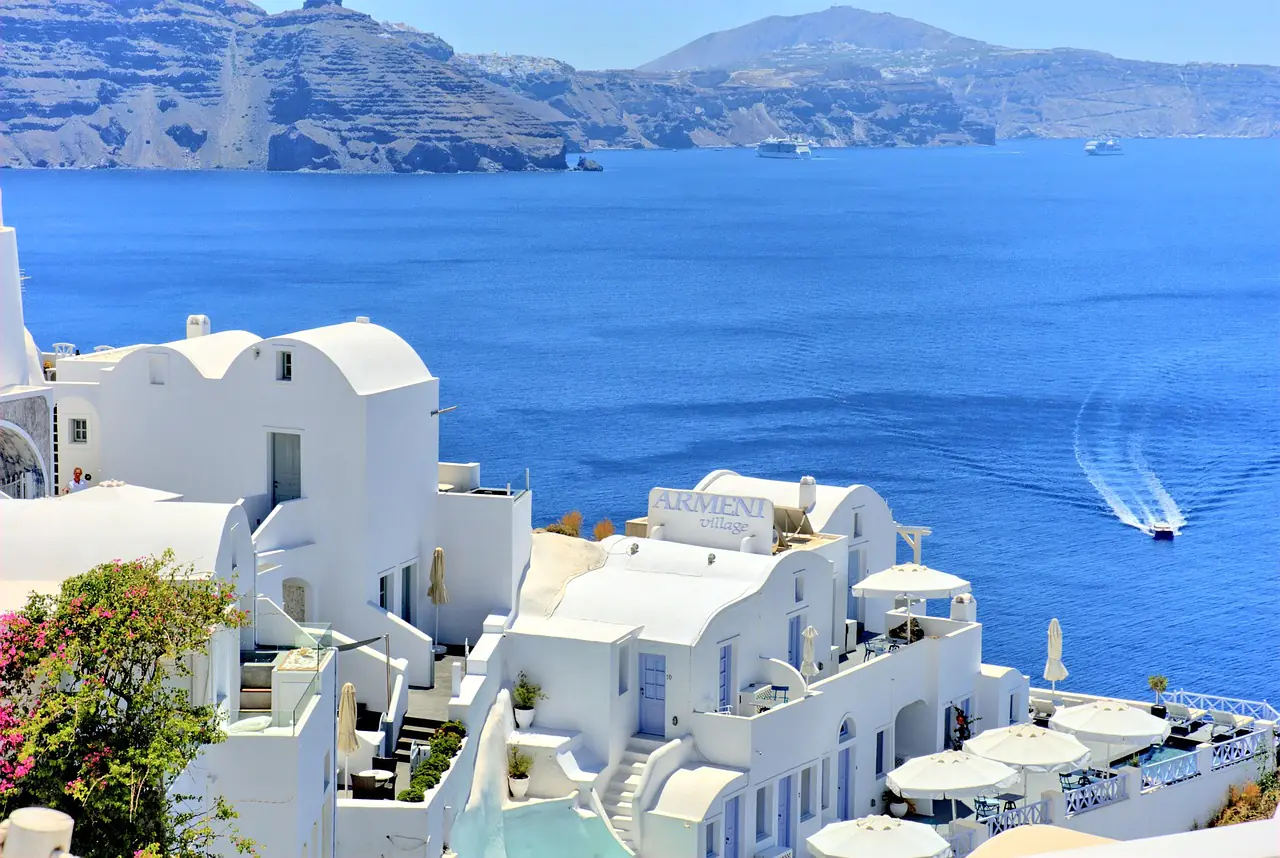 Santorini caldera view from Oia with blue-domed chapel