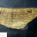 Fragment of the Dead Sea Scrolls — Pesher Isaiah from Qumran Cave 4, written in Hebrew on parchment