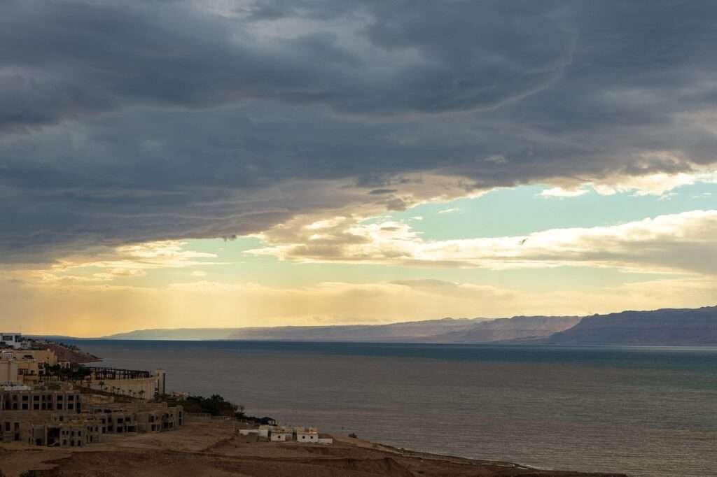 Dead Sea coast in Jordan under dramatic storm clouds