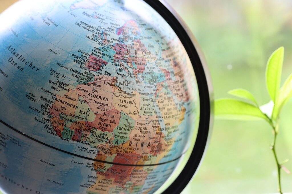 Globe focused on Europe, North Africa, and the Middle East with country names (German labels), illustrating native country names (endonyms).