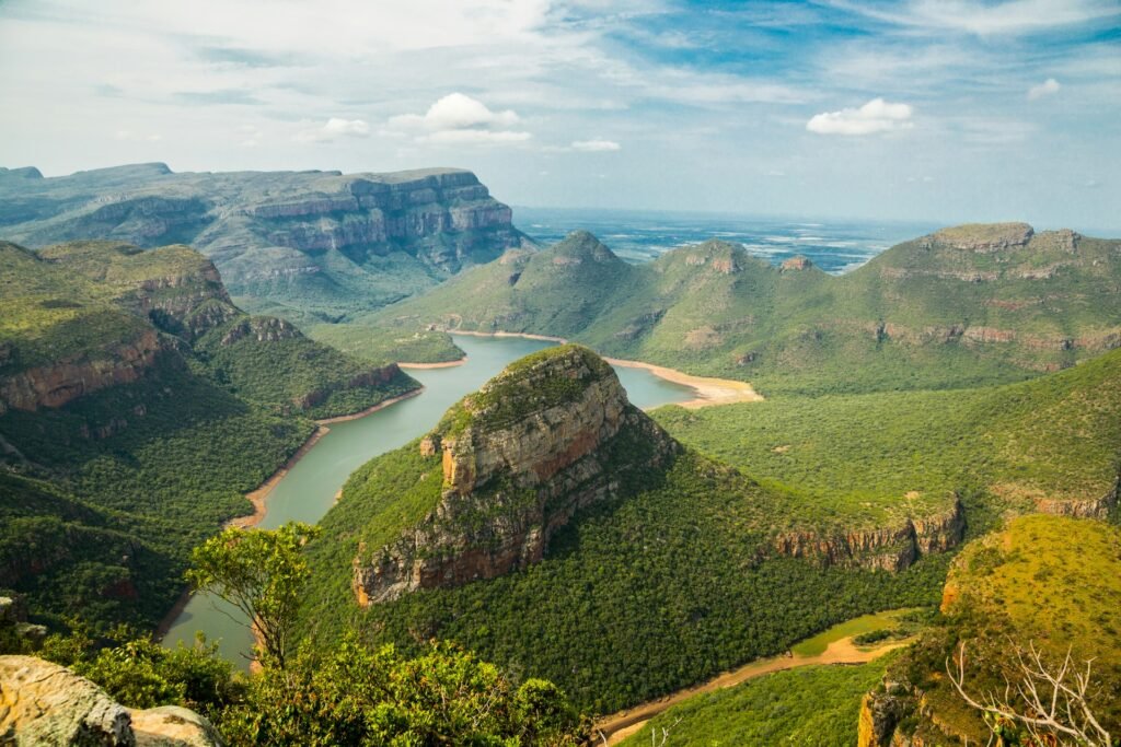 Blyde River Canyon with curving river and forested buttes, Panorama Route, Mpumalanga, South Africa.