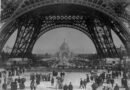 Crowds beneath the Eiffel Tower’s arches at the 1889 Exposition Universelle, Paris