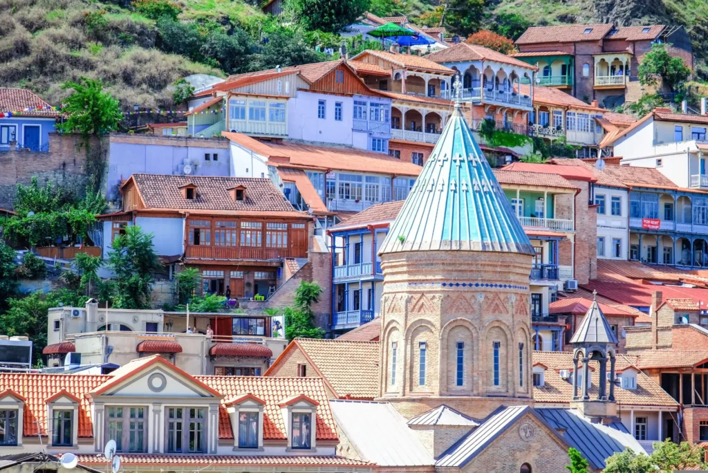 Old Tbilisi hillside with traditional houses and a church dome in central Tbilisi, Georgia