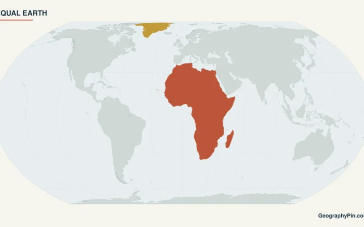 Equal Earth world map with Africa highlighted in terracotta and Greenland in gold against neutral land and pale blue oceans.